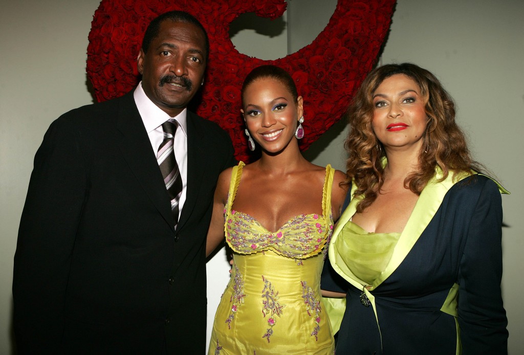 NEW YORK - JUNE 23:  (EXCLUSIVE) (L-R) Singer Beyonce Knowles (C) poses with her father and  manager Matthew Knowles and her mother Tina Knowles at the "Beyonce: Beyond the Red Carpet auction presented by Beyonce and her mother Tina Knowles along with the House of Dereon to benefit the VH1 Save The Music Foundation June 23, 2005 in New York City. The exhibition will showcase 18-24 costumes worn by Beyonce chronicling her film, television and video appearances.  (Photo by Frank Micelotta/Getty Images)
