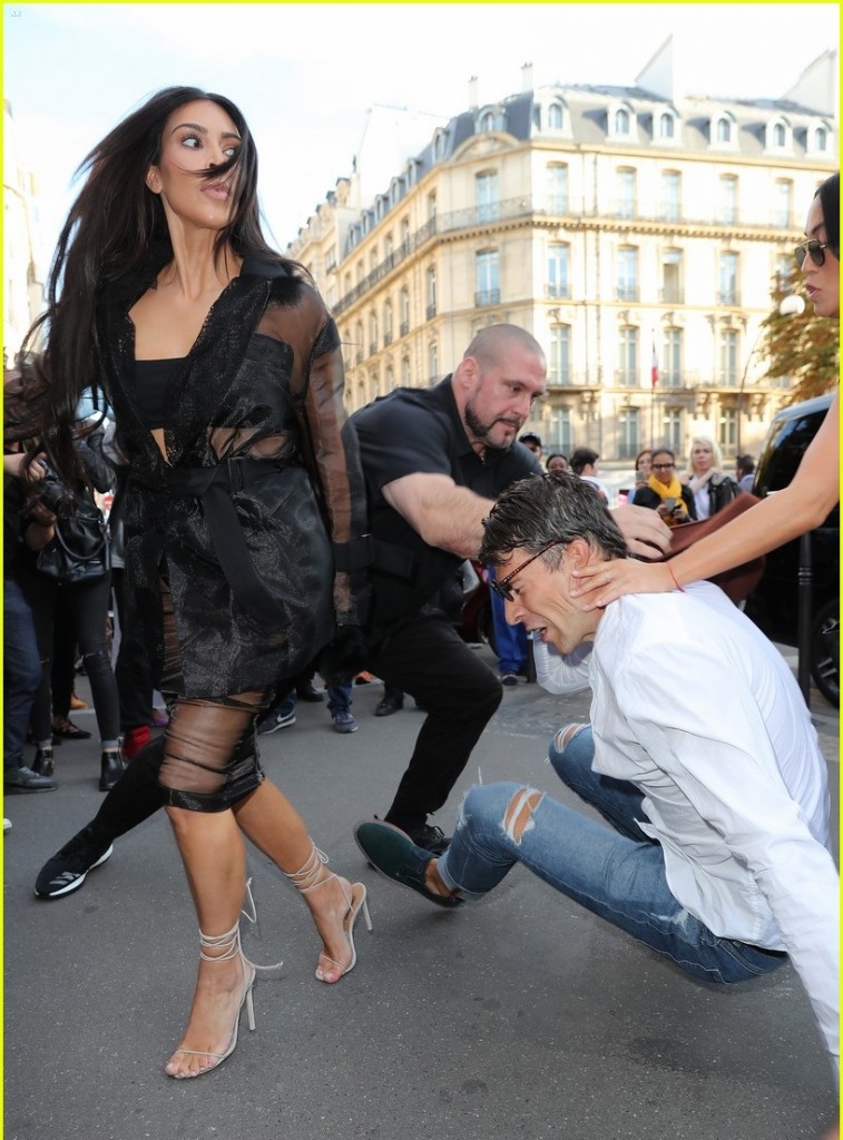 52188111 Ukrainian journalist Vitalii Sediuk is seen attepmting to kiss reality star Kim Kardashian's butt while at the Avenue restaurant in Paris, France on September 28, 2016. Vitalii quickly regretted this decision as he was immediately tackled to the ground by Kim's massive bodyguards! Vitalii also recently made headlines after grabbing Gigi Hadid outside the Max Mara fashion show in Milan. FameFlynet, Inc - Beverly Hills, CA, USA - +1 (310) 505-9876 RESTRICTIONS APPLY: USA ONLY